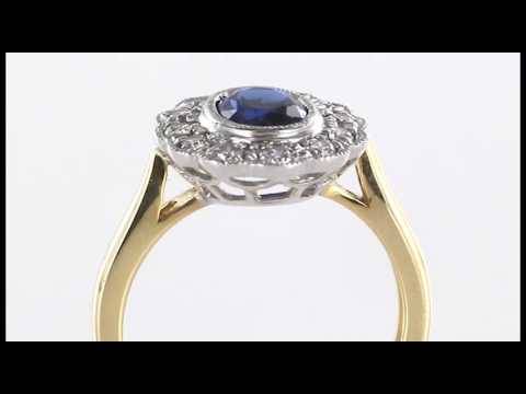 Oval Blue Sapphire and Diamond Halo Ring