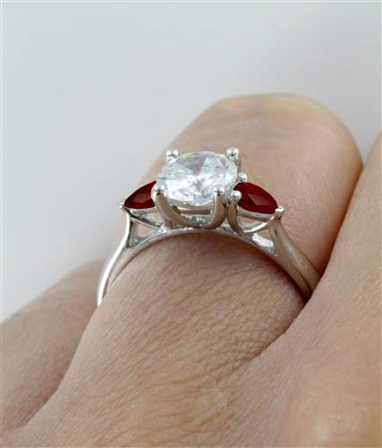 Diamond Centre and Ruby Side Trilogy Ring W