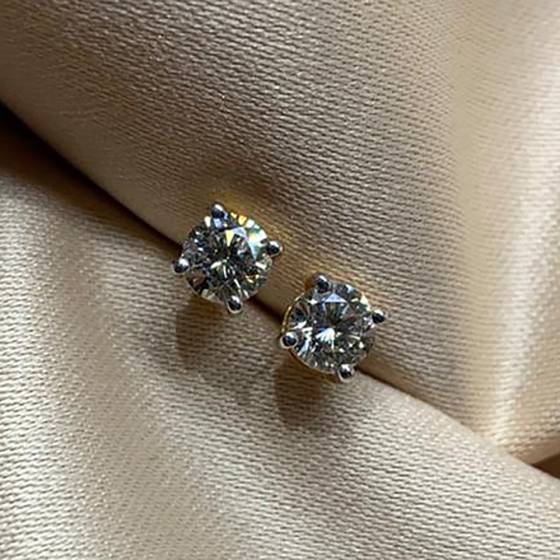 0.63ct SI/F-G Natural Round Cut Diamond Stud Earrings in 18k Yellow Gold