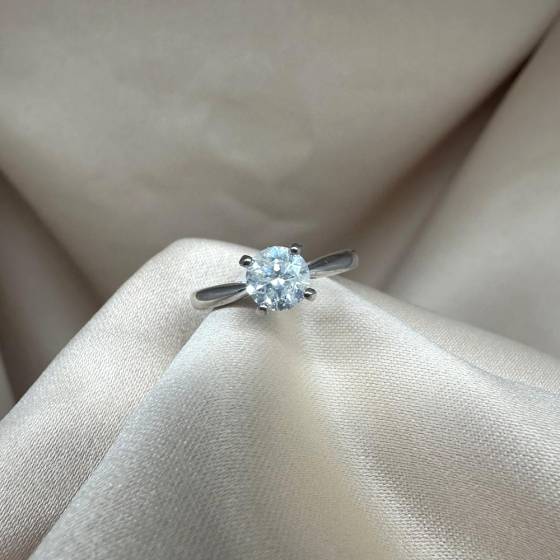 0.70ct I2/G Natural Round Cut Diamond 4 Claw Solitaire Ring in 18k White Gold