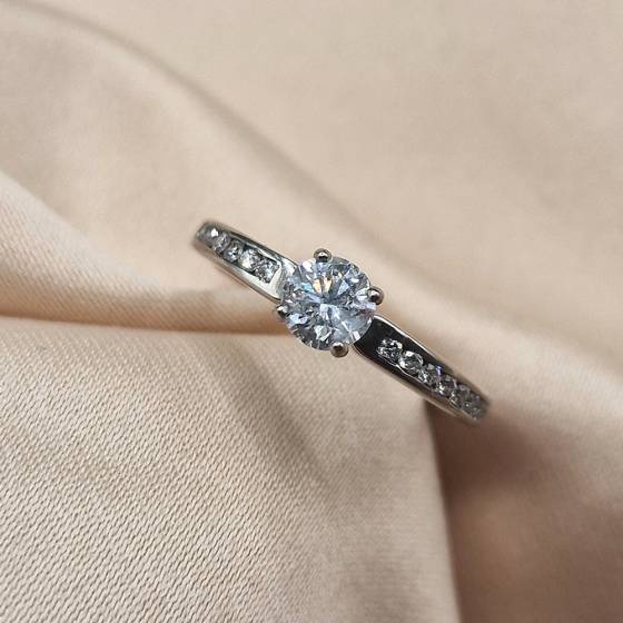 0.65ct SI2/F Natural Round Cut Diamond Shoulder Set Ring in 18k White Gold