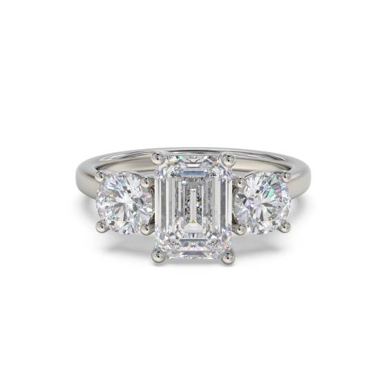 1.63ct VS1/D Emerald and Natural Round Diamond Trilogy Ring in Platinum