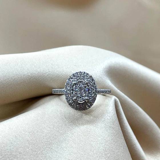 0.25ct VS/F Natural Round Cut Diamond Halo Ring in 18k White Gold