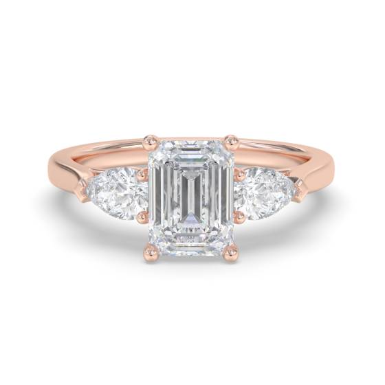 Elegant Emerald and Pear Diamond Trilogy Ring