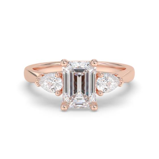 Elegant Emerald and Pear Diamond Trilogy Ring