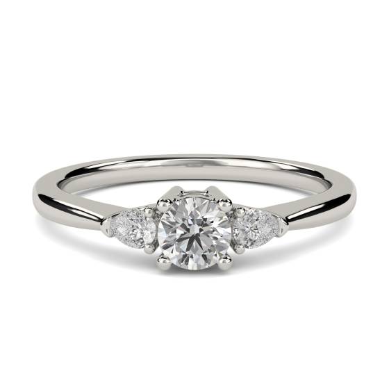 Elegant Round and Pear Diamond Trilogy Ring